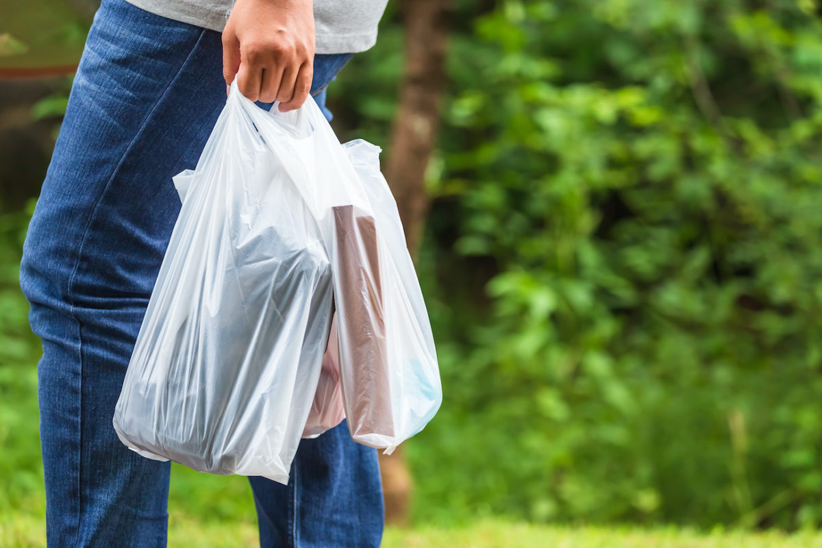 Want To Use A Plastic Bag In Pouch Cove Starting Jan 1 It Ll Cost   Person Holding Plastic Shopping Bag 1200x800 