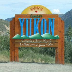 A sign signals the border of the Yukon Territory.
